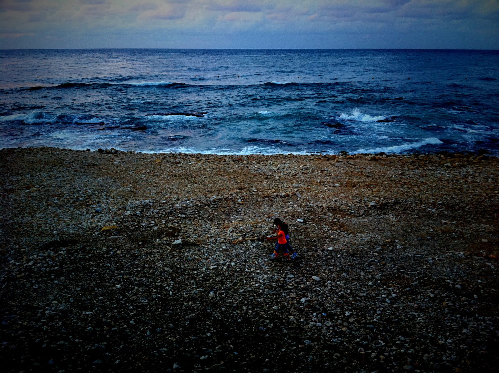 Girls walking on the beach in Beirut